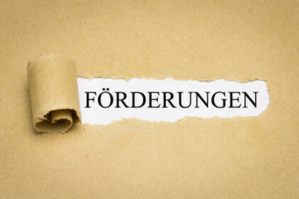ein aufgerissens Bild mit dem Wort Förderungen